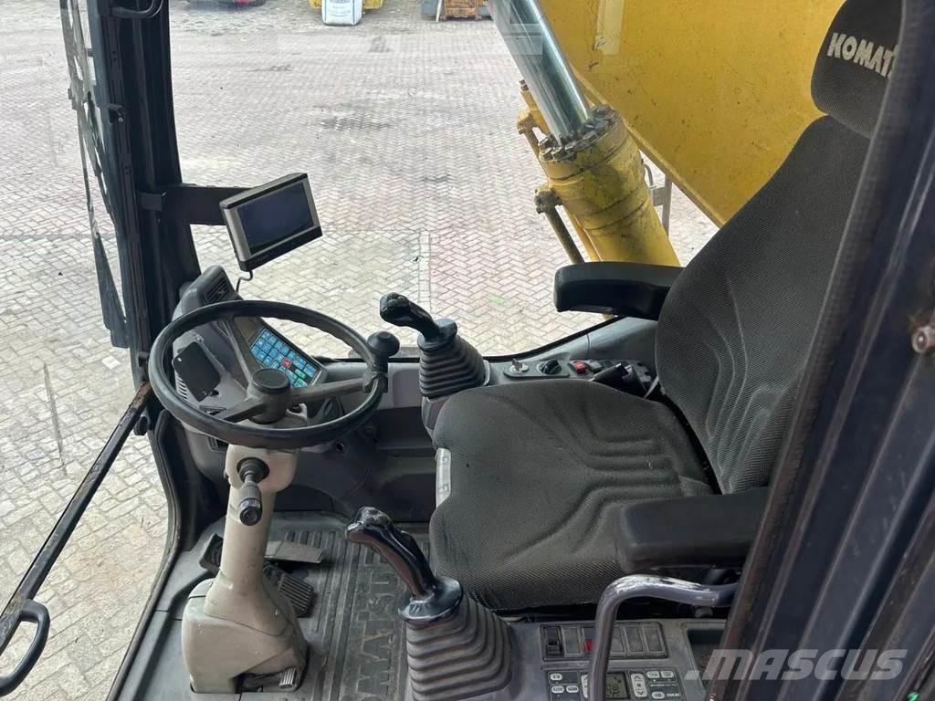 Komatsu PW200 Ekskavatori uz riteņiem