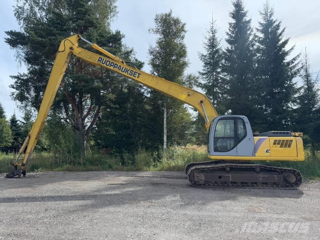 New Holland E 215 Ekskavatori tālās sniedzamības darbiem