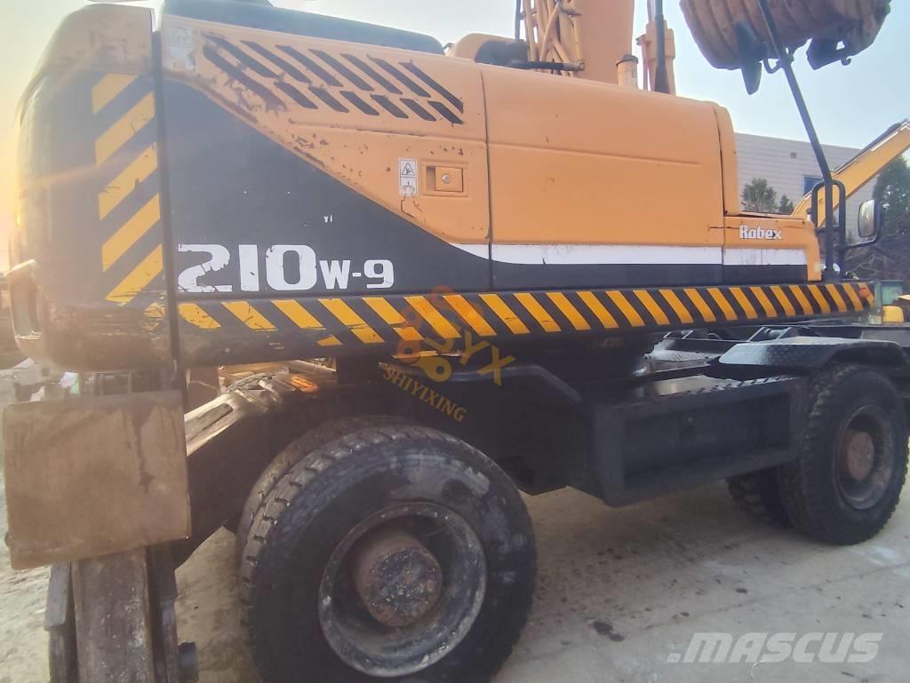 Hyundai 210W-9 Ekskavatori uz riteņiem