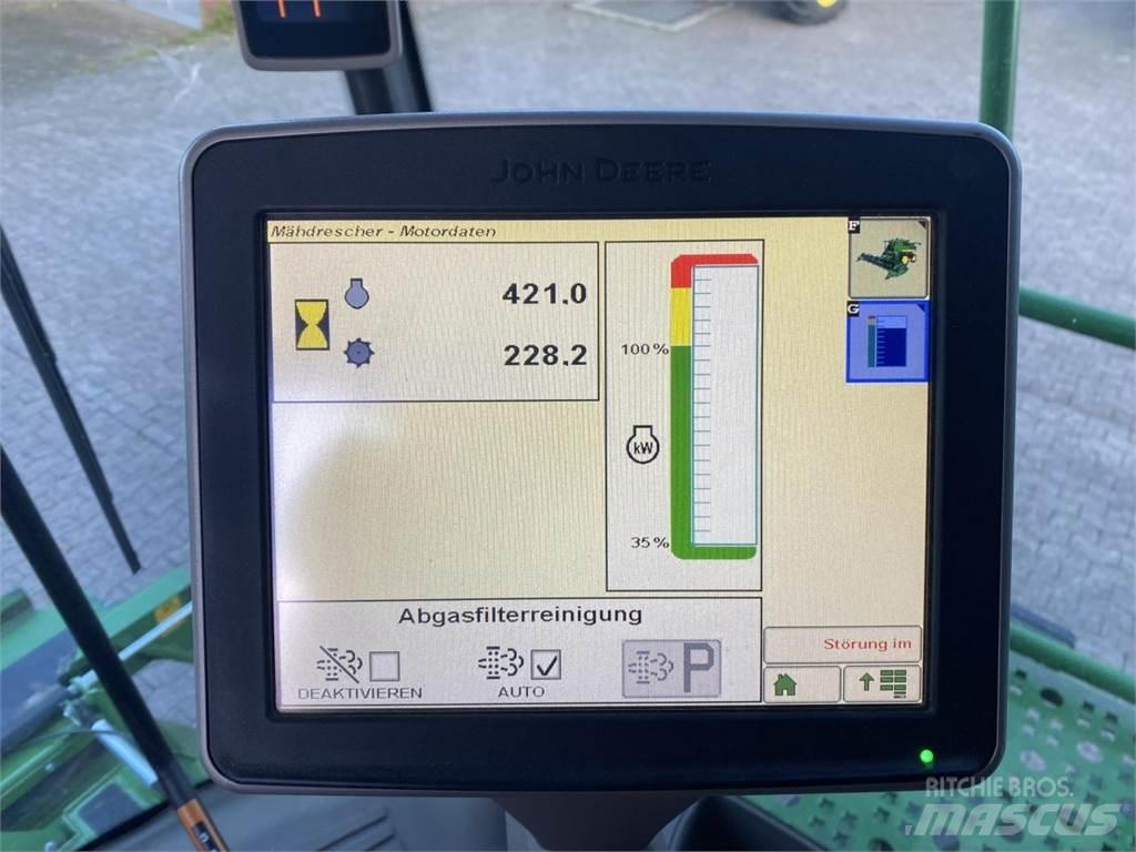 John Deere T550 Ražas novākšanas kombaini