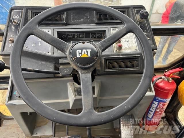 CAT 428 B Ekskavatori-iekrāvēji