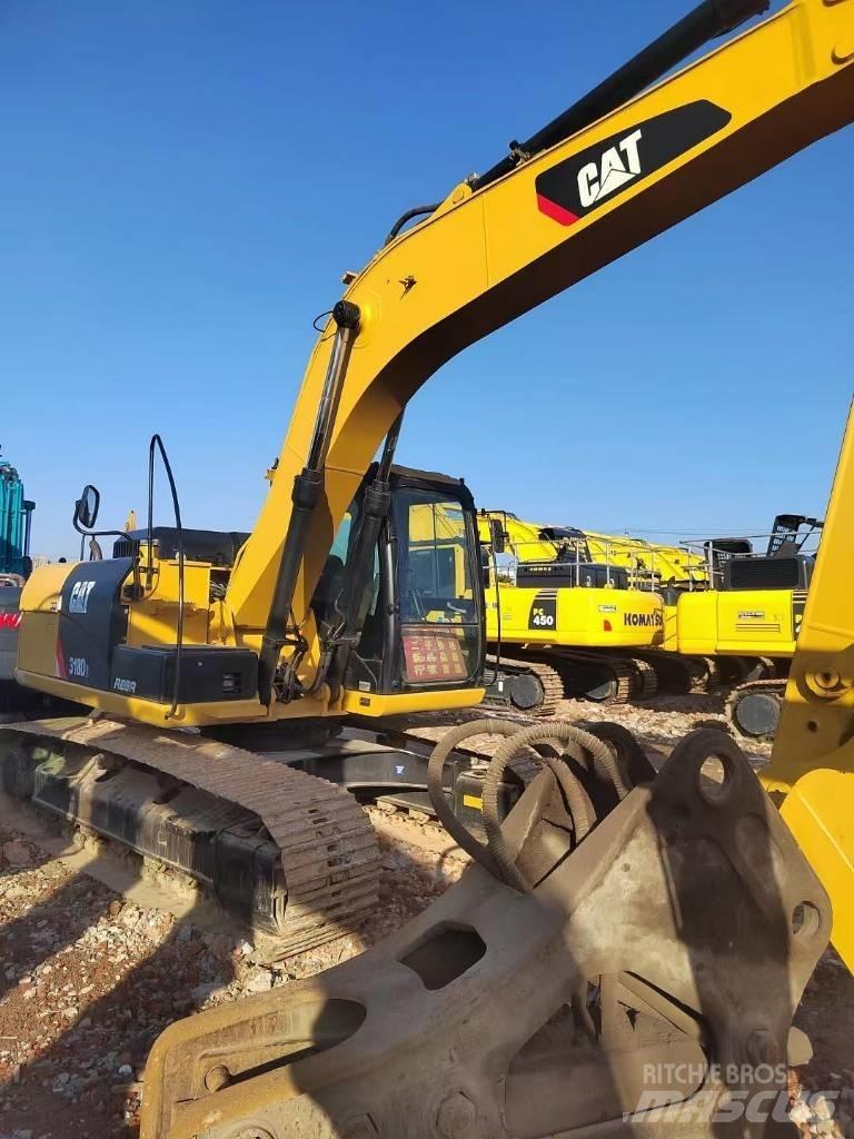 CAT 318 Kāpurķēžu ekskavatori