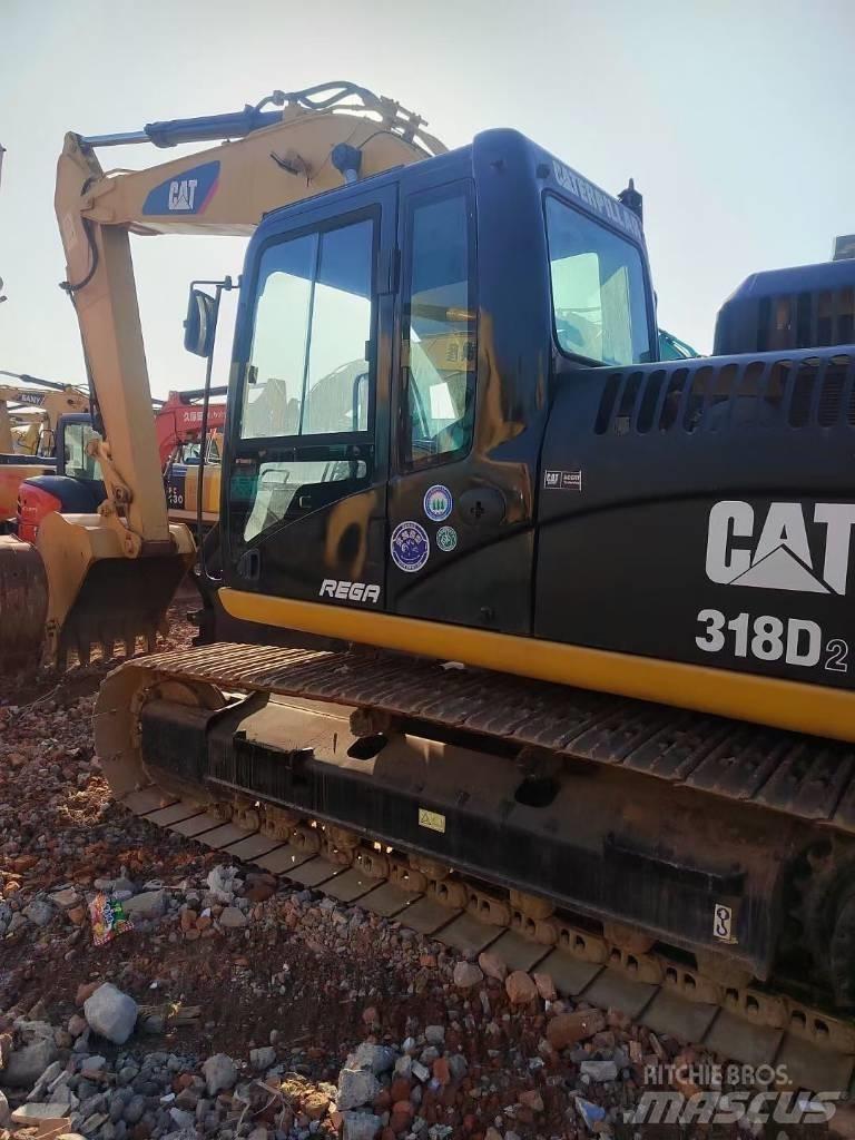 CAT 318 Kāpurķēžu ekskavatori