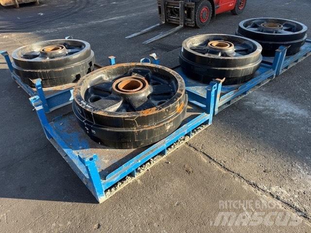 CAT 6020 NEW IDLER Sliedes, ķēdes un šasija