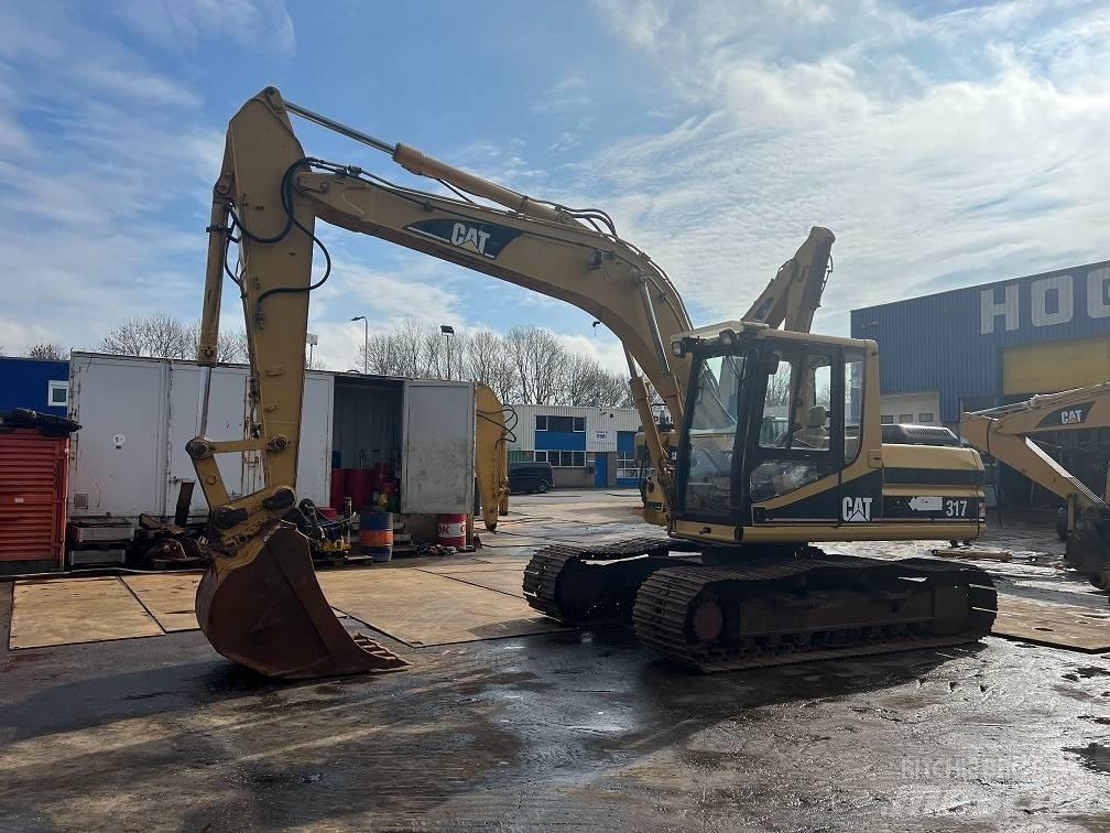 CAT 317 Kāpurķēžu ekskavatori