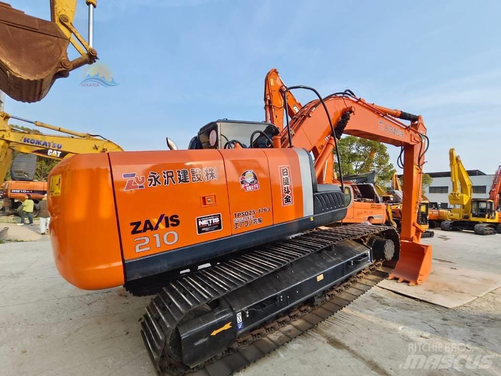Hitachi ZX 210 Kāpurķēžu ekskavatori