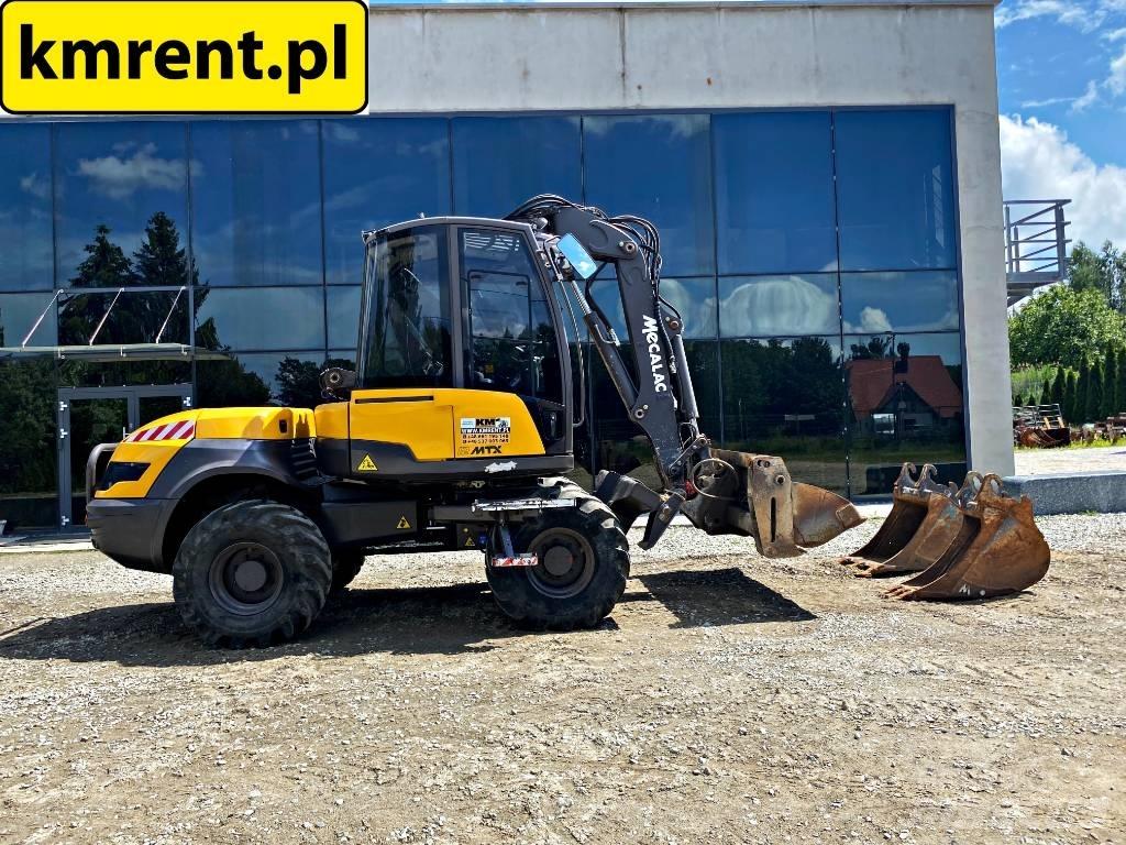Mecalac 12 M TX Ekskavatori-iekrāvēji