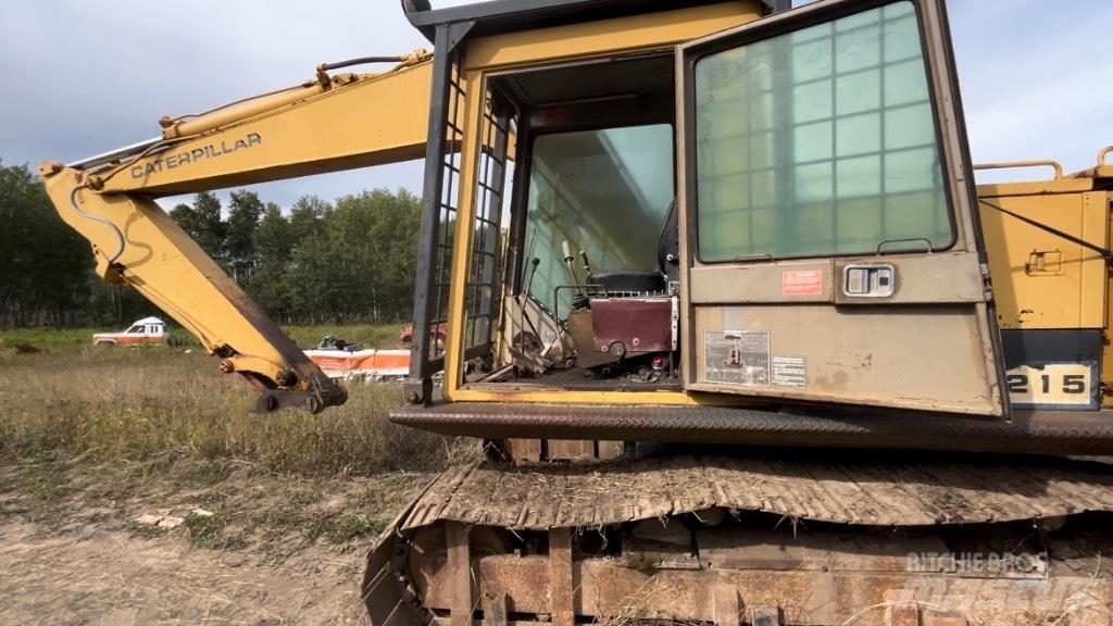 CAT 215 Kāpurķēžu ekskavatori