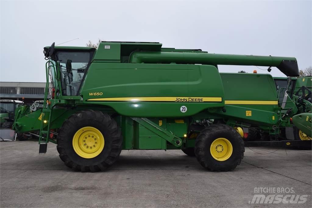 John Deere W 650 Ražas novākšanas kombaini