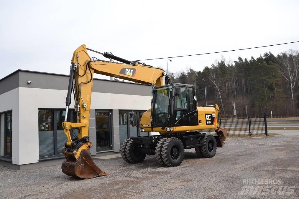 CAT M 315 D Ekskavatori uz riteņiem