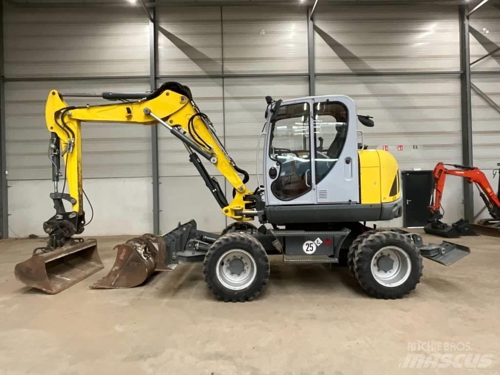 Neuson EW 100 Ekskavatori uz riteņiem