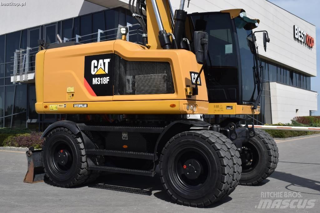 CAT M 318 F Ekskavatori uz riteņiem