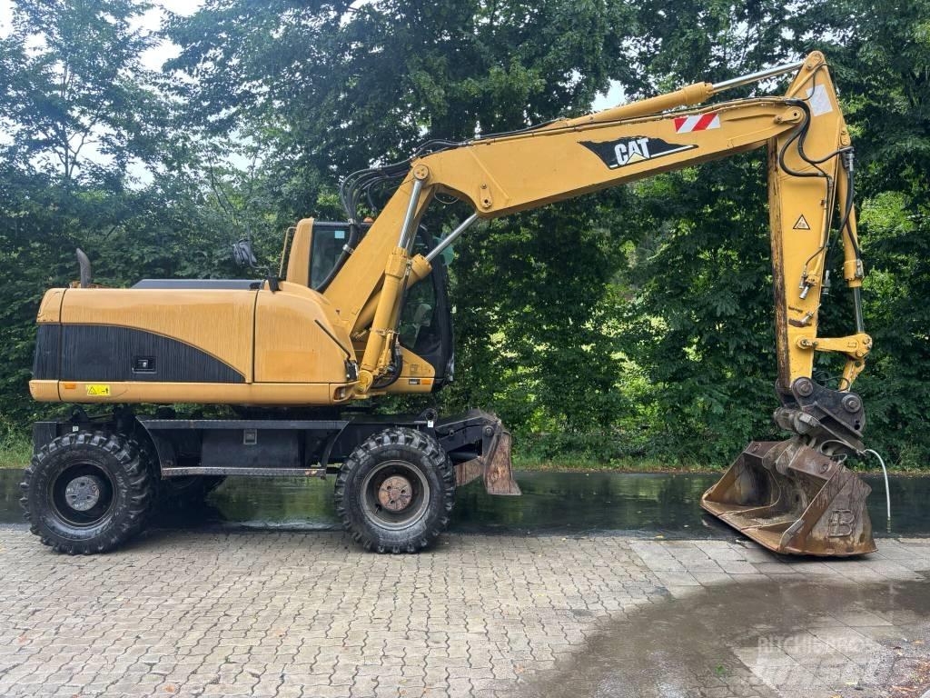 CAT M 316 C Ekskavatori uz riteņiem