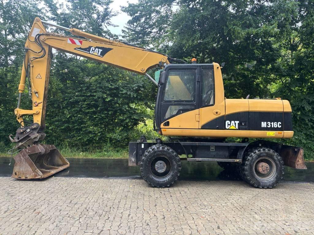 CAT M 316 C Ekskavatori uz riteņiem