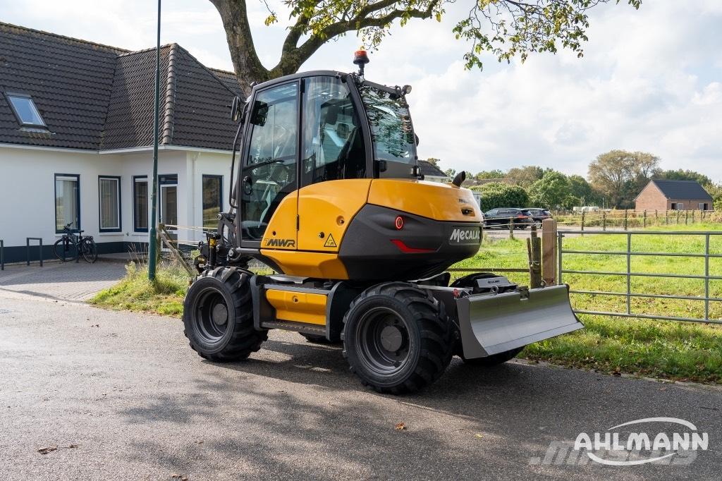 Mecalac 7 MWR Engcon Ekskavatori uz riteņiem