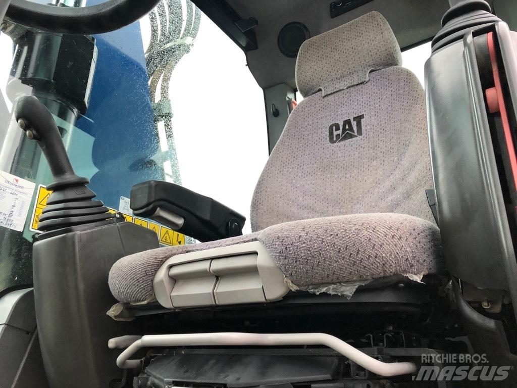 CAT M318F Ekskavatori uz riteņiem