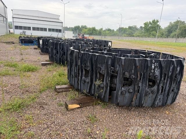 CAT 6020 new parts Sliedes, ķēdes un šasija
