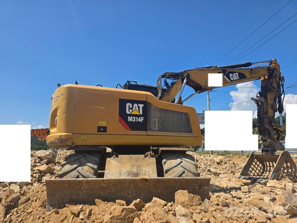CAT 314F Ekskavatori uz riteņiem