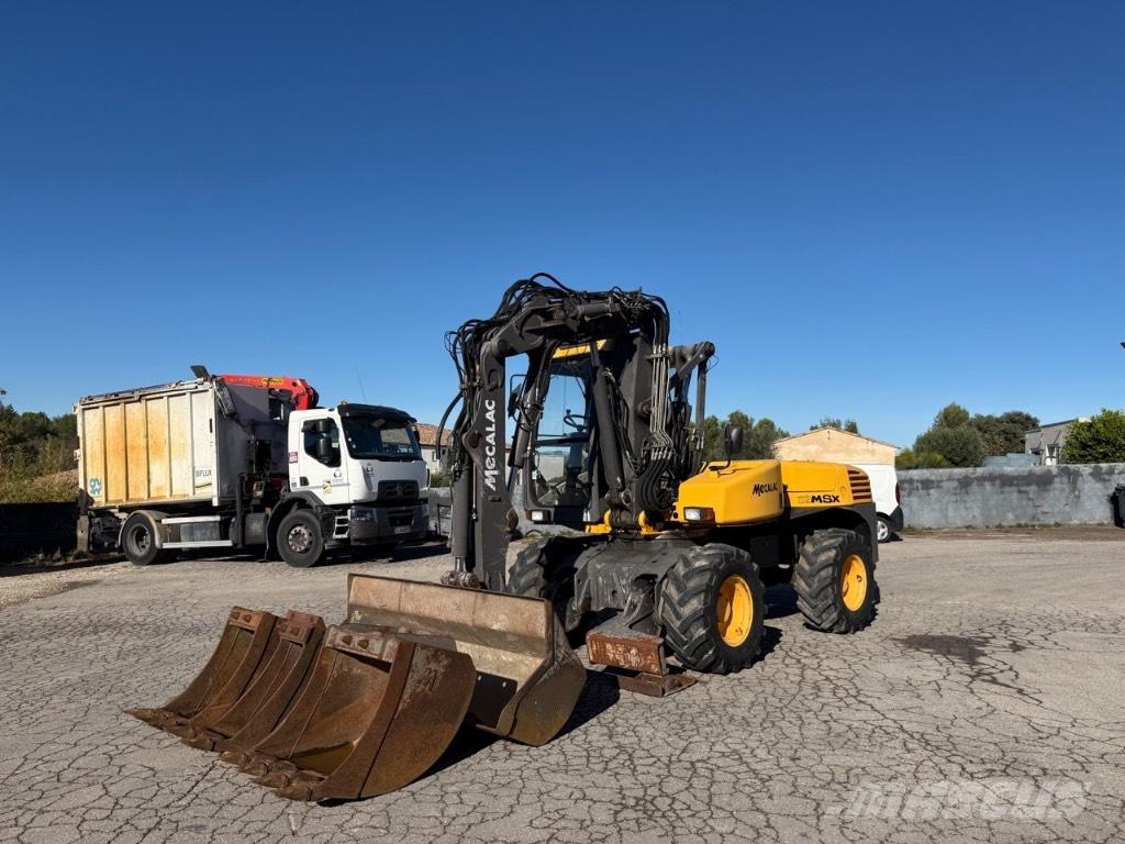 Mecalac 12 MSX Ekskavatori uz riteņiem