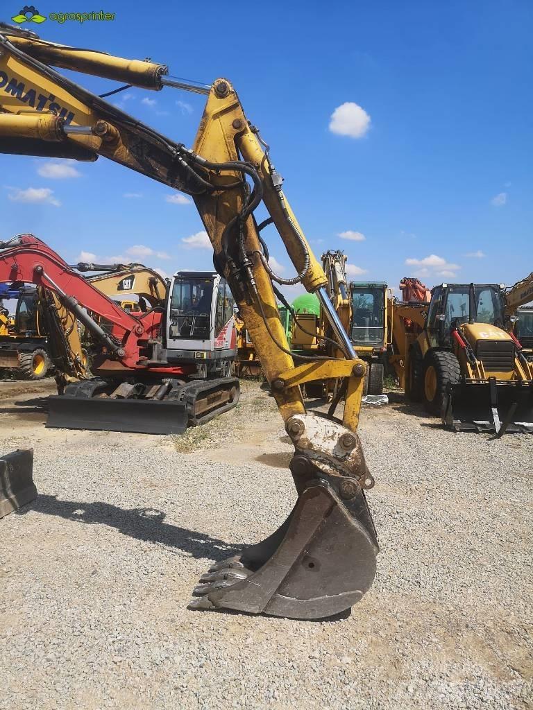 Komatsu PW 95 Vidēja lieluma ekskavatori 7 t - 12 t