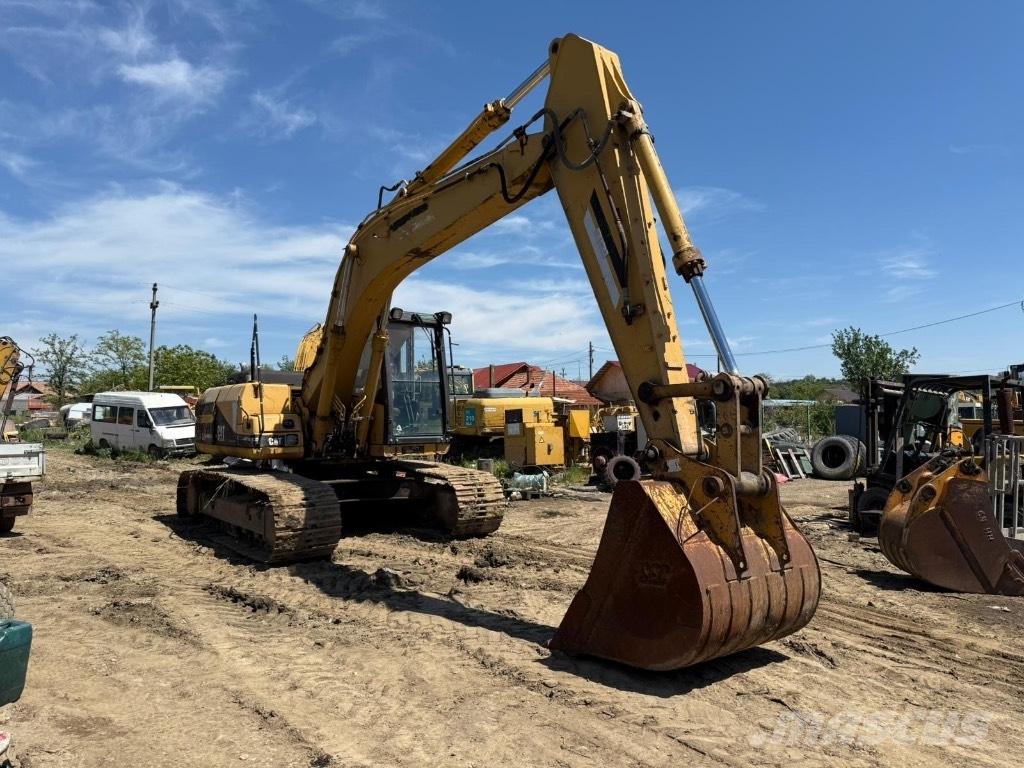 CAT 318 Šasija un piekare
