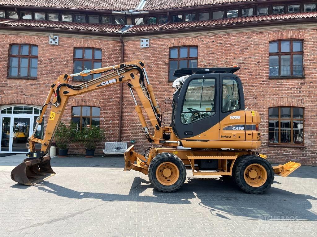 CASE WX 95 Ekskavatori uz riteņiem