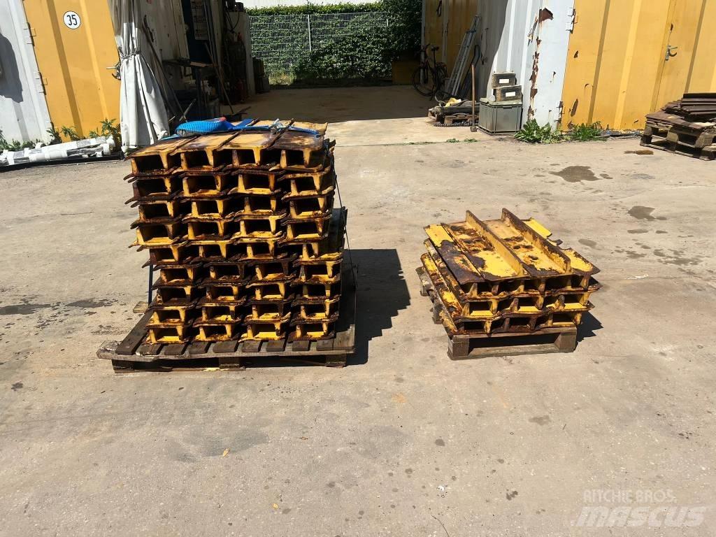 CAT D 6 Sliedes, ķēdes un šasija