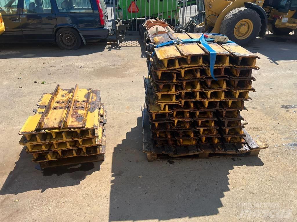 CAT D 6 Sliedes, ķēdes un šasija