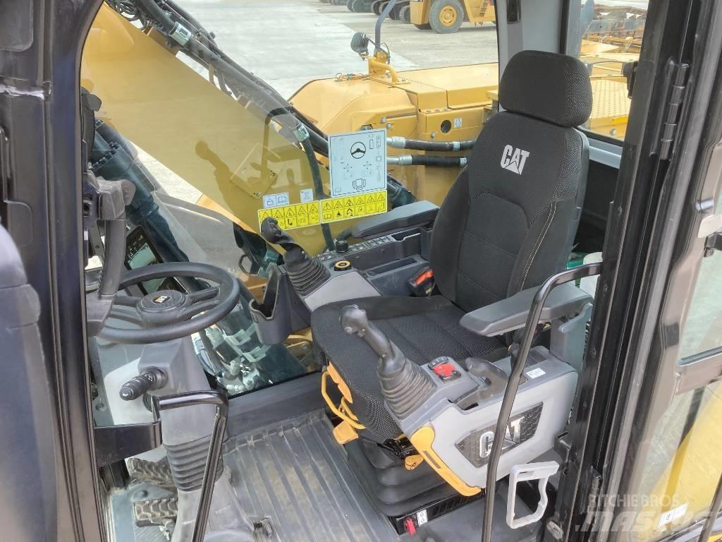 CAT M314 Ekskavatori uz riteņiem