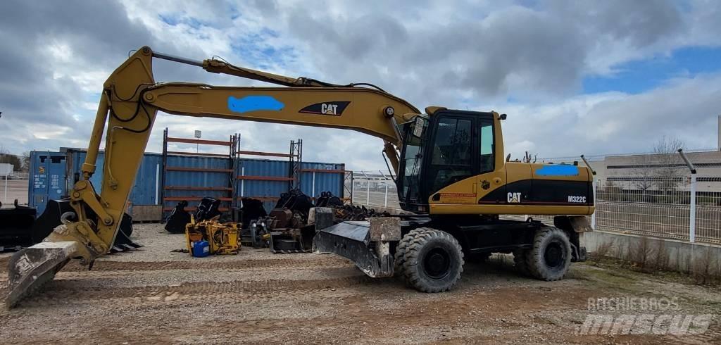 CAT M 322 C HCR Ekskavatori uz riteņiem
