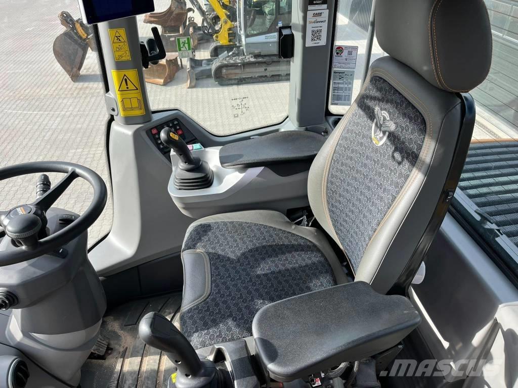 CASE 521 Iekrāvēji uz riteņiem