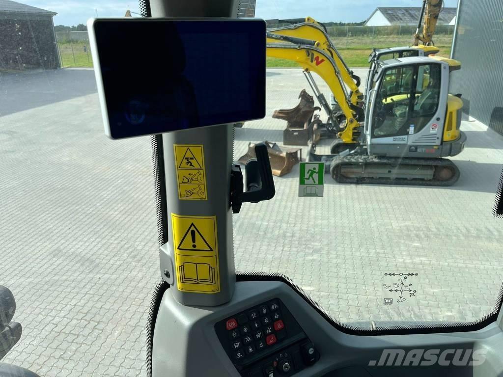 CASE 521 Iekrāvēji uz riteņiem