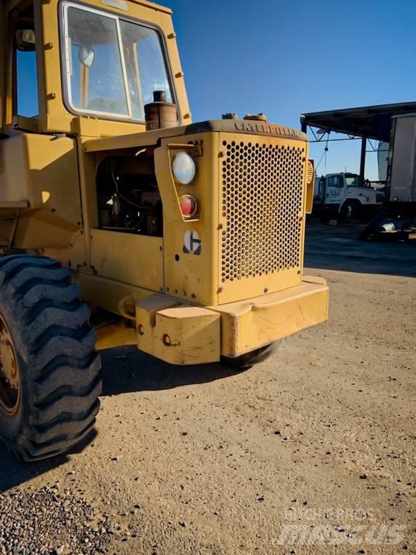 CAT 920 Iekrāvēji uz riteņiem