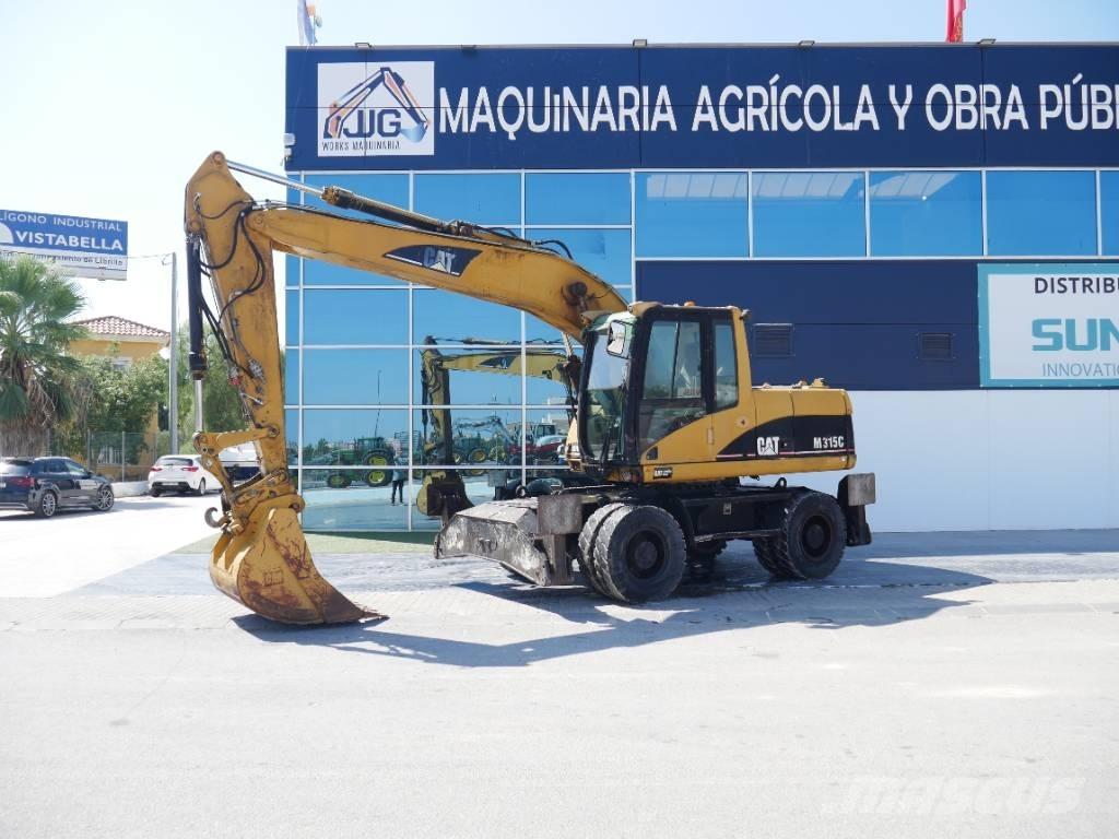 CAT M 315 C Ekskavatori uz riteņiem