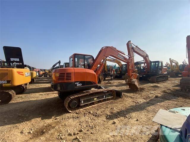 Doosan DX80 Vidēja lieluma ekskavatori 7 t - 12 t