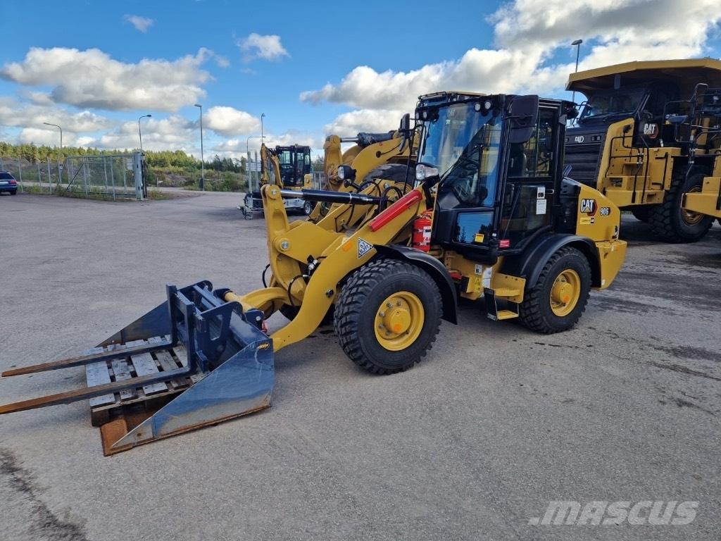 CAT 906 Iekrāvēji uz riteņiem
