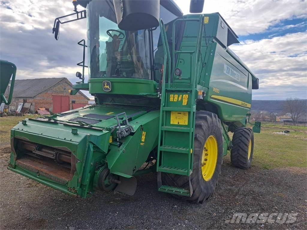 John Deere W650 Ražas novākšanas kombaini