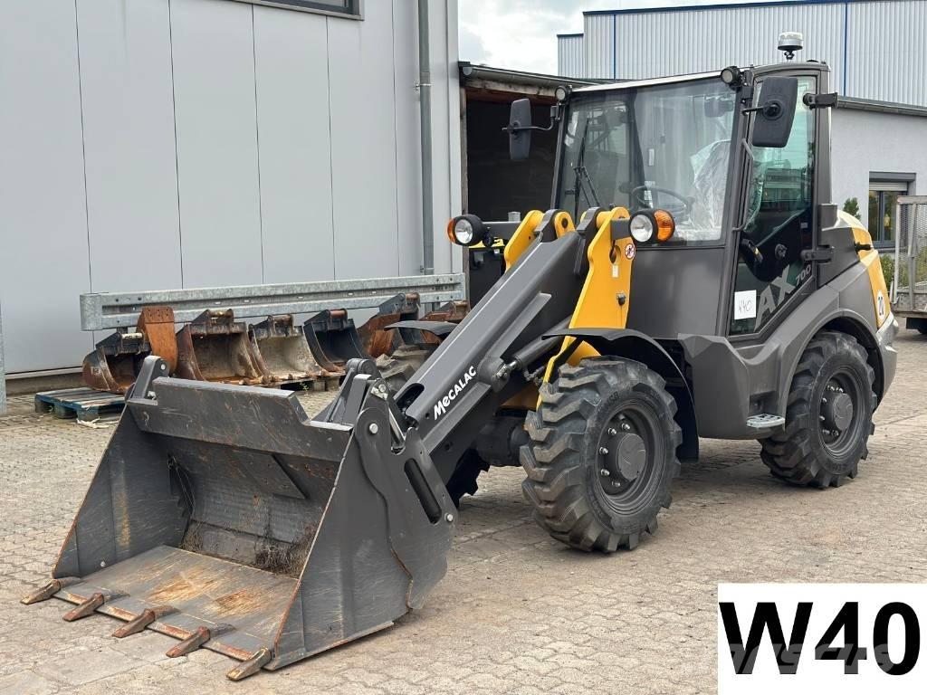 Mecalac AX 700 Iekrāvēji uz riteņiem