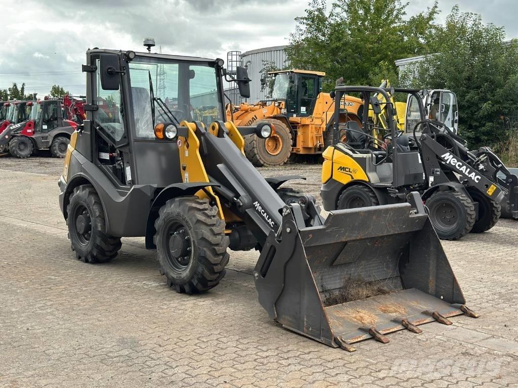 Mecalac AX 700 Iekrāvēji uz riteņiem