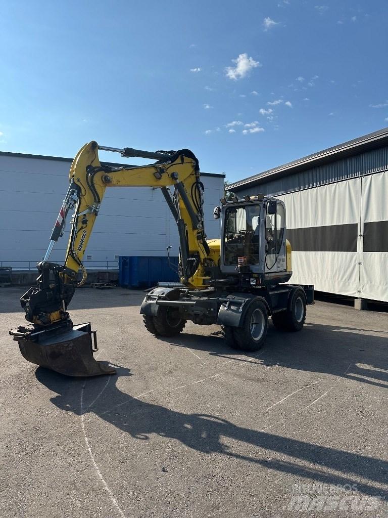 Wacker Neuson EW 100 Ekskavatori uz riteņiem