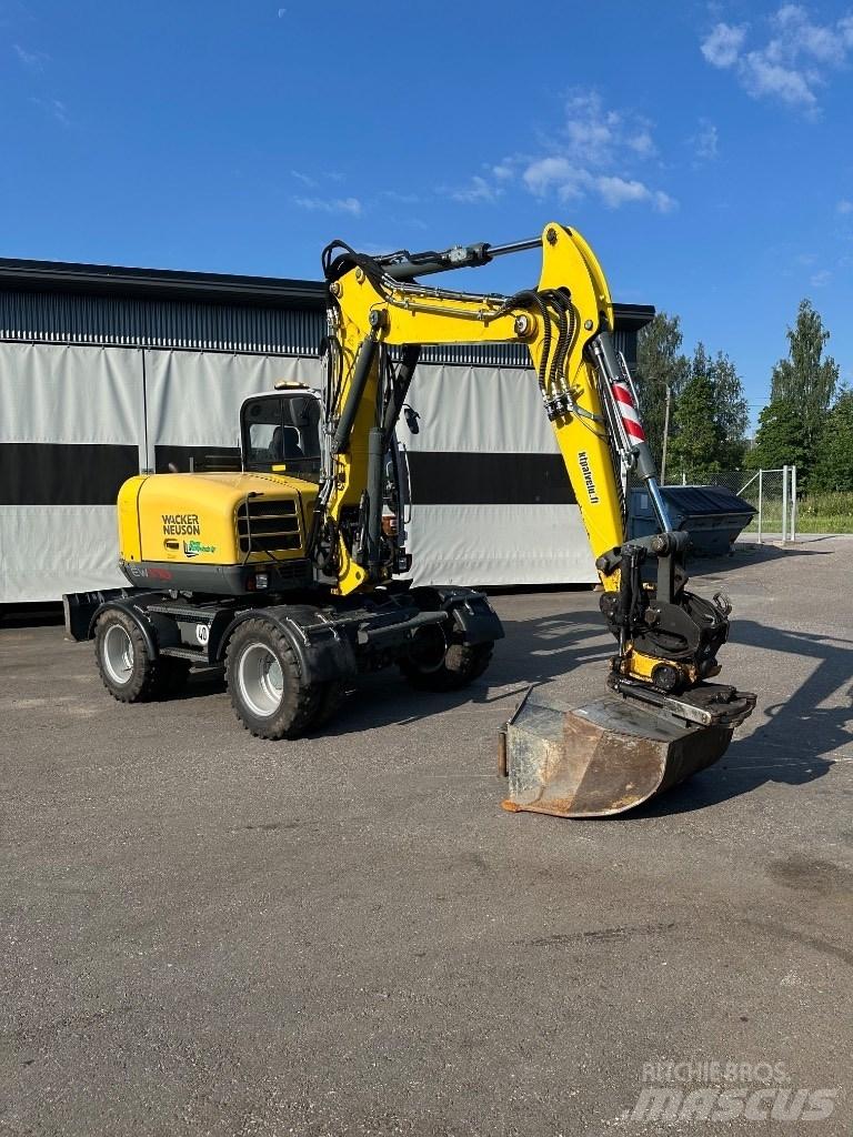 Wacker Neuson EW 100 Ekskavatori uz riteņiem