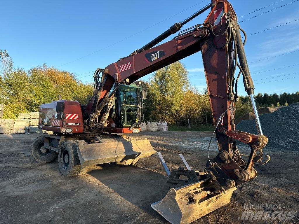 CAT 313 D Ekskavatori uz riteņiem