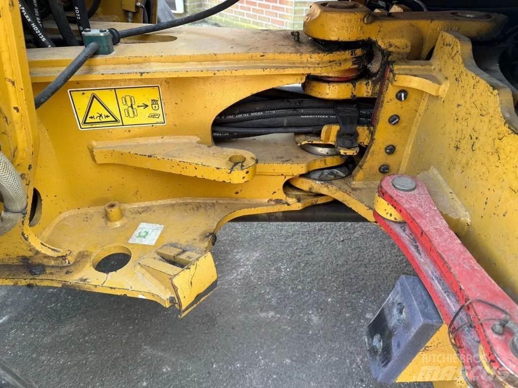 CAT 907M Iekrāvēji uz riteņiem