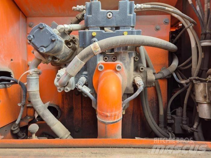 Doosan DX210WA Ekskavatori uz riteņiem
