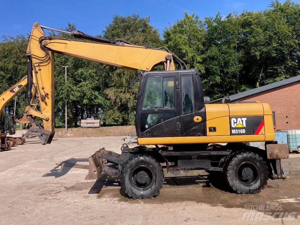 CAT M 316 D Ekskavatori uz riteņiem