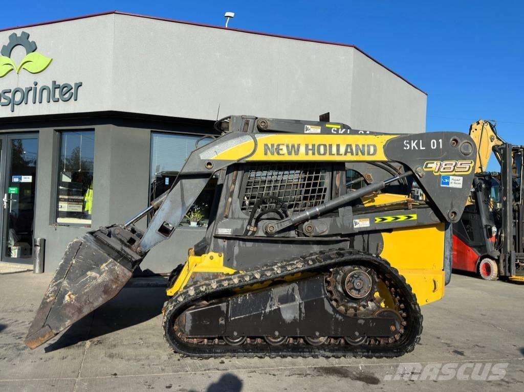 New Holland C 185 Lietoti riteņu kompaktiekrāvēji
