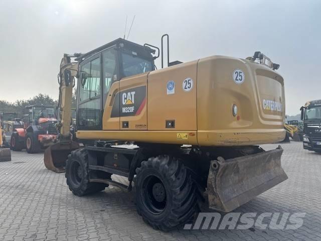 CAT M 320 F Ekskavatori uz riteņiem