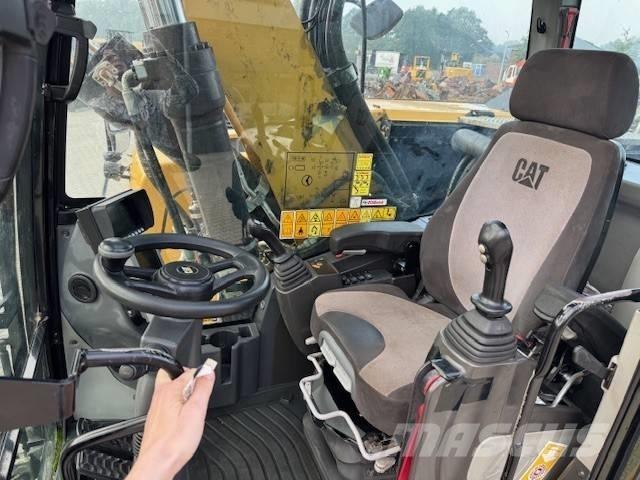 CAT M 320 F Ekskavatori uz riteņiem