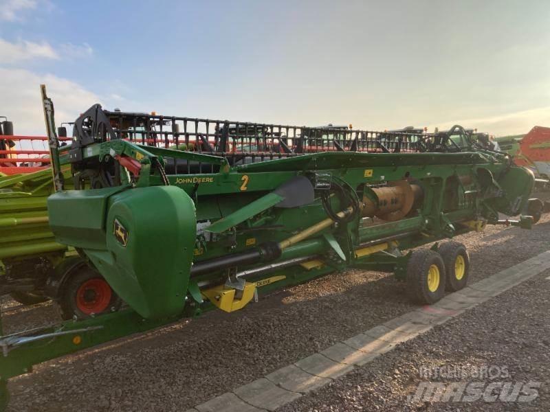 John Deere T660 i Ražas novākšanas kombaini