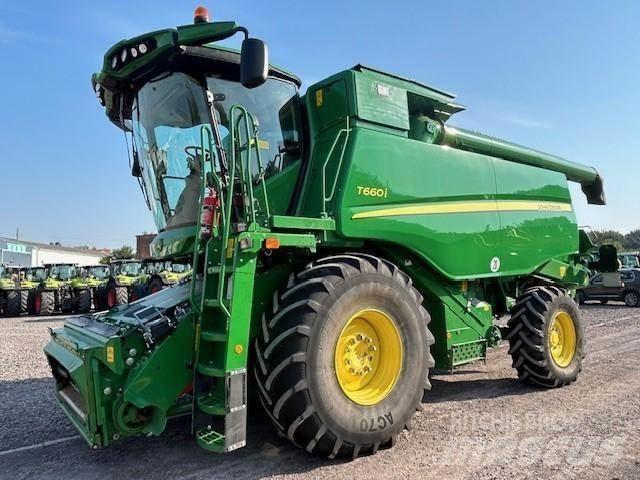 John Deere T660 i Ražas novākšanas kombaini